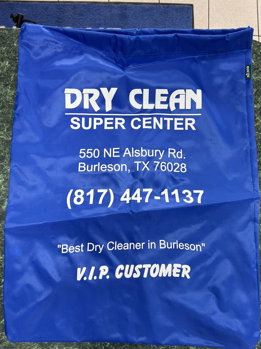 Blue Dry Clean Super Center V.I.P. Customer drawstring laundry bag printed with the store address and phone number